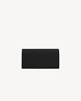 CASSANDRE MATELASSÉ LARGE FLAP WALLET IN GRAIN DE POUDRE LEATHER