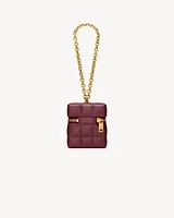 CASSANDRE MATELASSÉ CARRÉ mini cube on chain in shiny leather