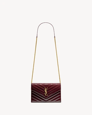 CASSANDRE envelope chain wallet in patent leather