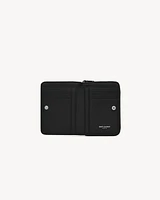 CASSANDRE MATELASSÉ compact zip around wallet in grain de poudre leather