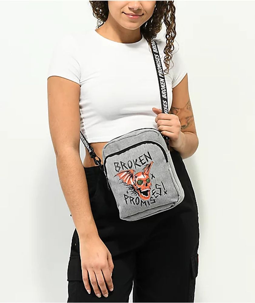 https://cdn.mall.adeptmind.ai/https%3A%2F%2Fscene7.zumiez.com%2Fis%2Fimage%2Fzumiez%2Fproduct_main_medium%2FBroken-Promises-Batwing-Heather-Grey-Crossbody-Bag-_355231-back-US.jpg_large.jpg