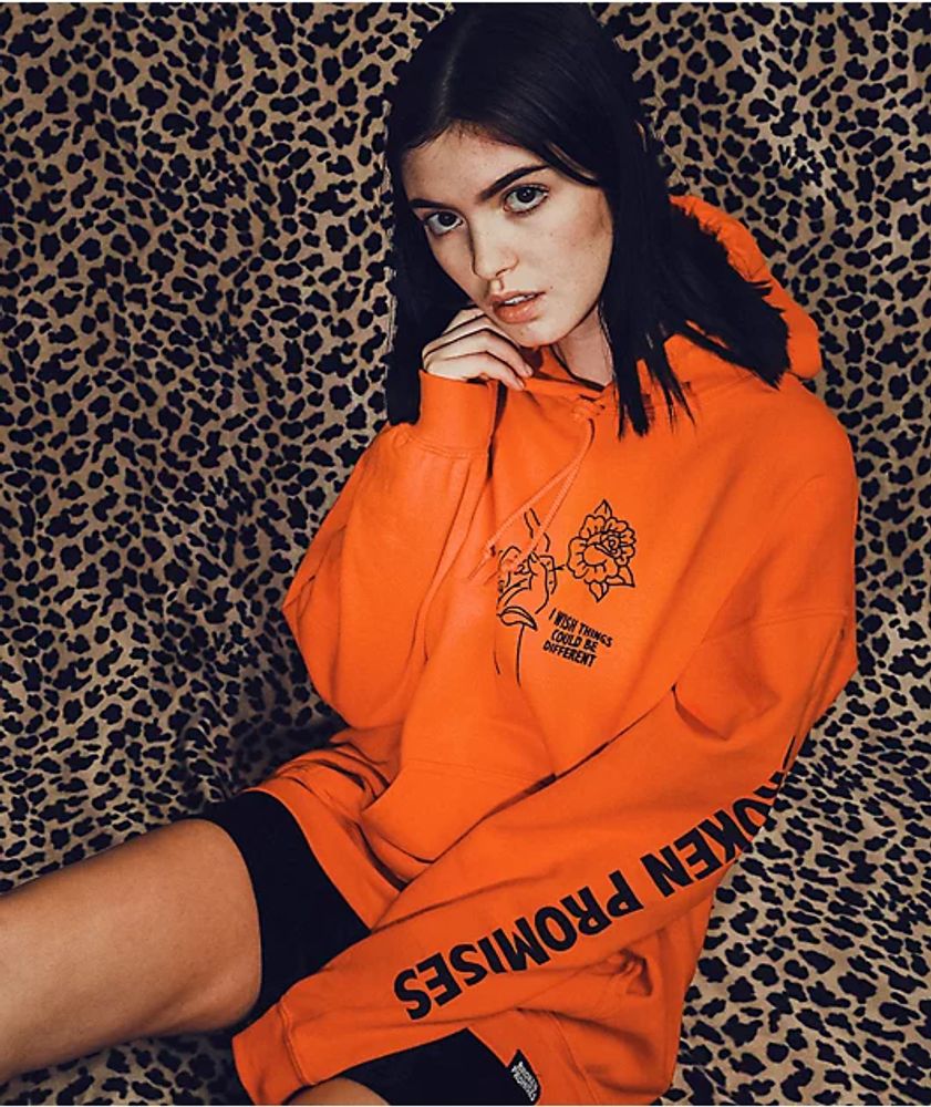 broke orange hoodie