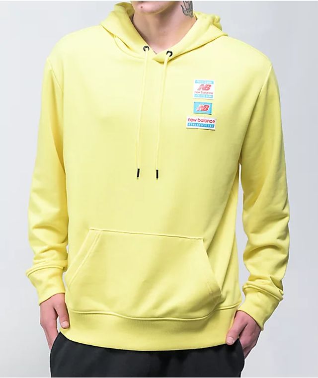 New Balance Essentials Yellow Hoodie | Mall of America®