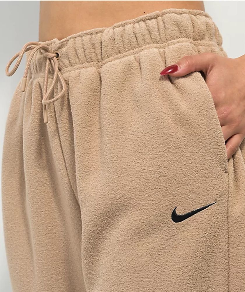 Nike Unisex plush mini swoosh fleece joggers in rattan beige
