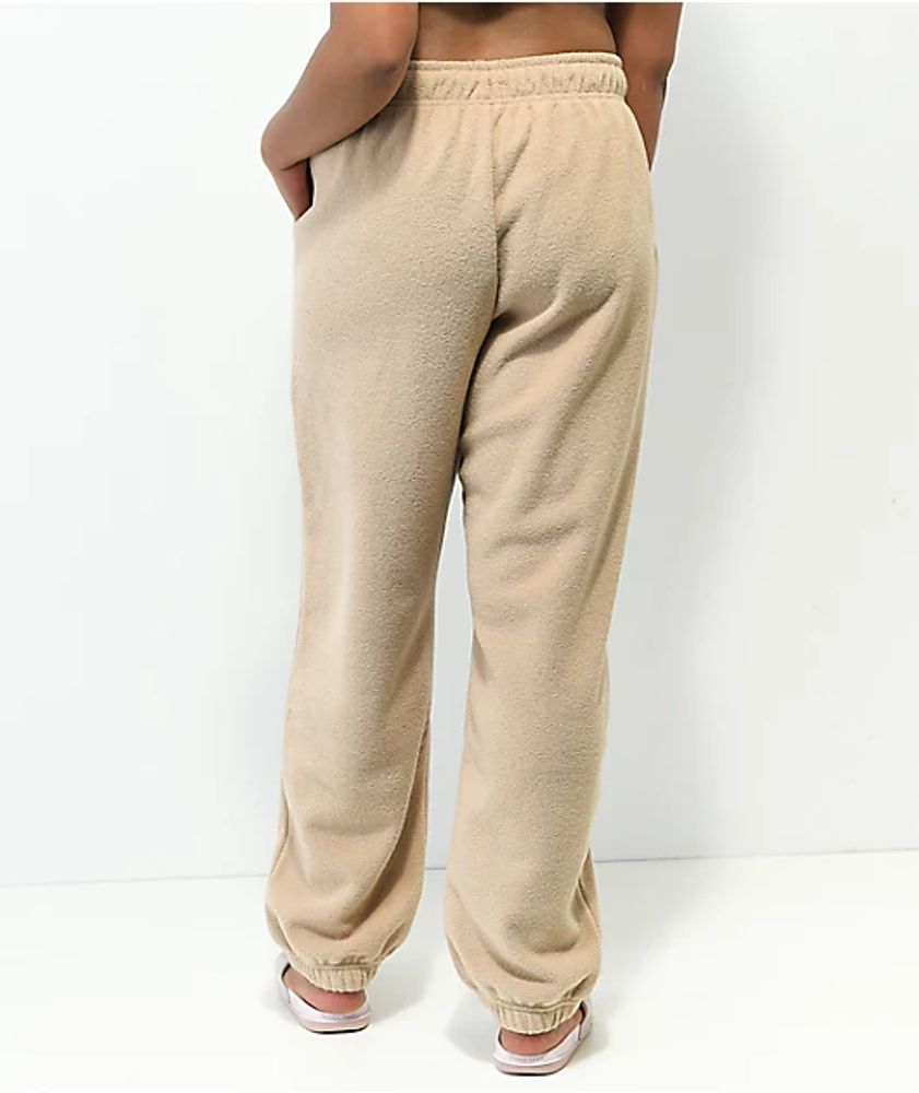Nike Essentials Plush high-rise cuffed fleece sweatpants in bronze - BROWN, ASOS