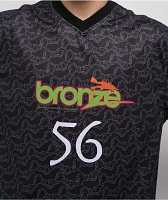 Bronze 56K Trust Black Soccer Jersey