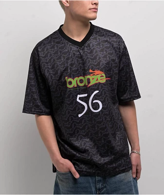 Bronze 56K Trust Black Soccer Jersey