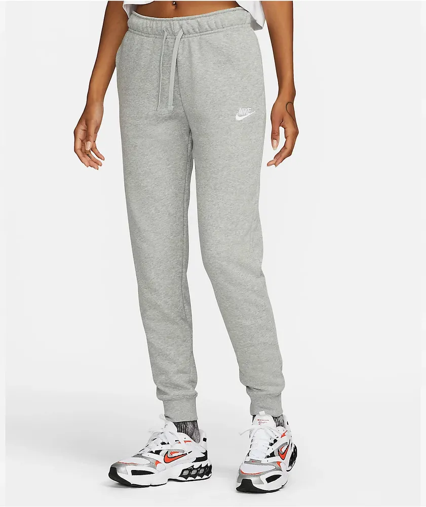 https://cdn.mall.adeptmind.ai/https%3A%2F%2Fscene7.zumiez.com%2Fis%2Fimage%2Fzumiez%2Fproduct_main_medium_2x%2FNike-Sportswear-Club-Fleece-Grey-Jogger-Sweatpants-_182527-front-CA.jpg_large.webp