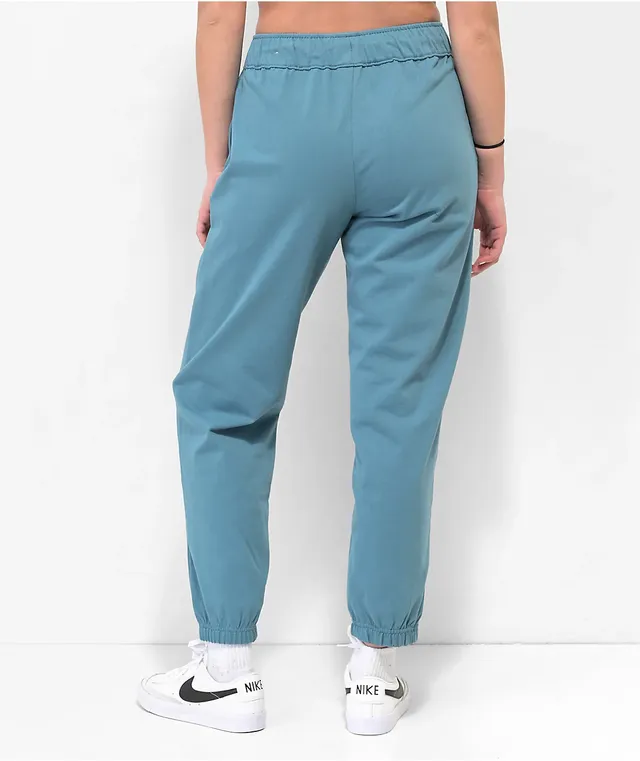 Vintage Nike sweatpants joggers elastic cuff, faded blue size small 28W+  Stretch