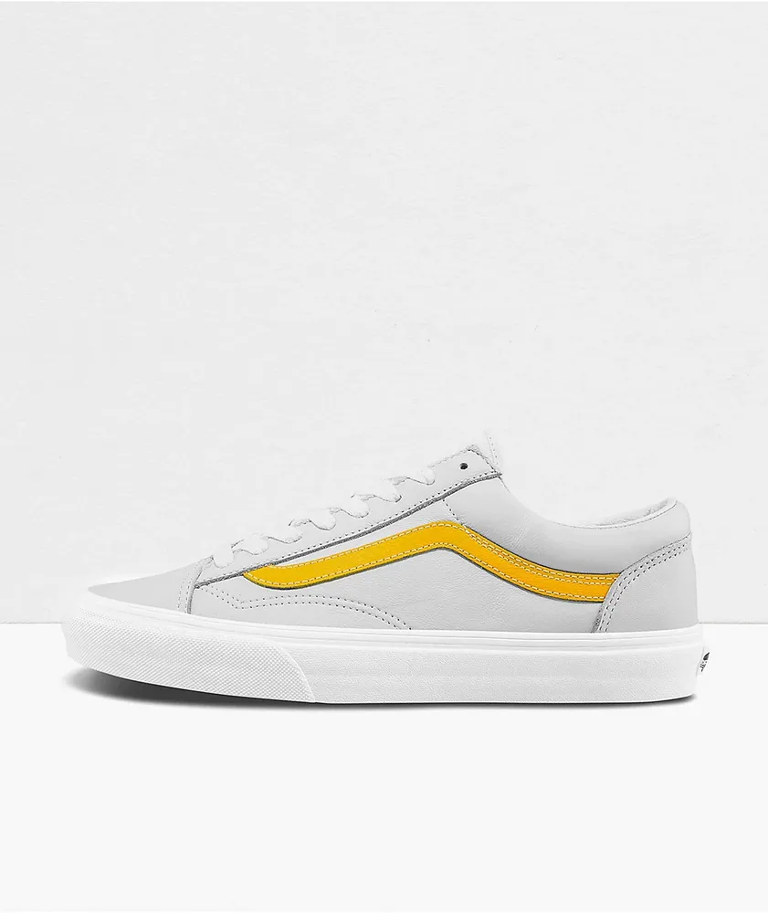 grey and yellow vans