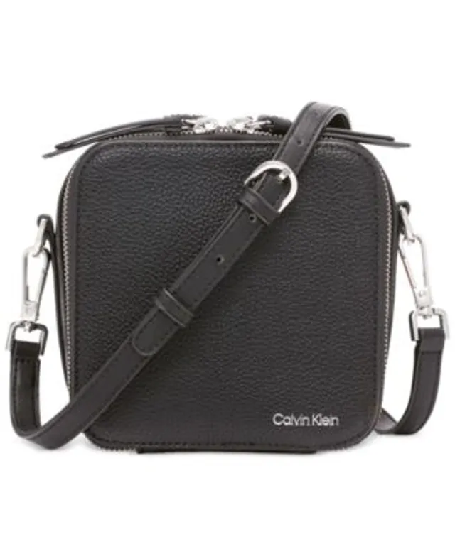 Calvin Klein Argo Top Zip Triangle Crossbody in Yellow