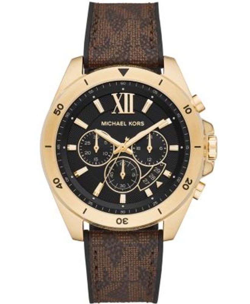 Michael Kors gold watch and Accessory Concierge bracelet, and