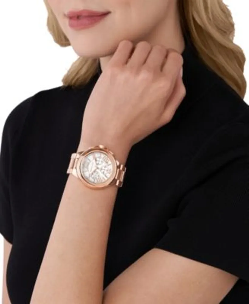 Michael Kors gold watch and Accessory Concierge bracelet, and