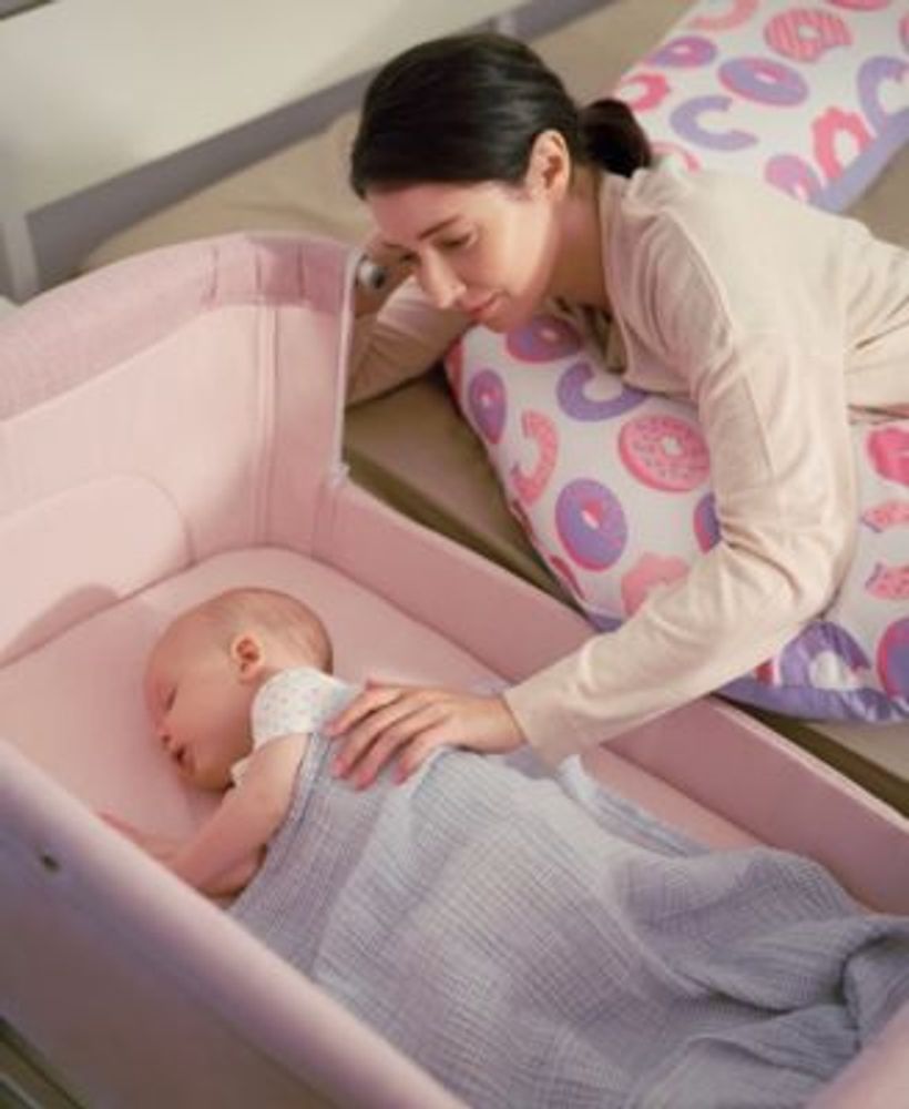 Pink Hugme Plus Bedside Sleeper Bassinet Includes Mattress and Travel Bag