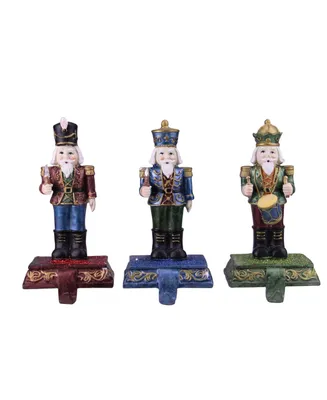 Northlight Set of 3 Red Blue and Green Glittered Nutcracker Christmas Stocking Holders 7.75"