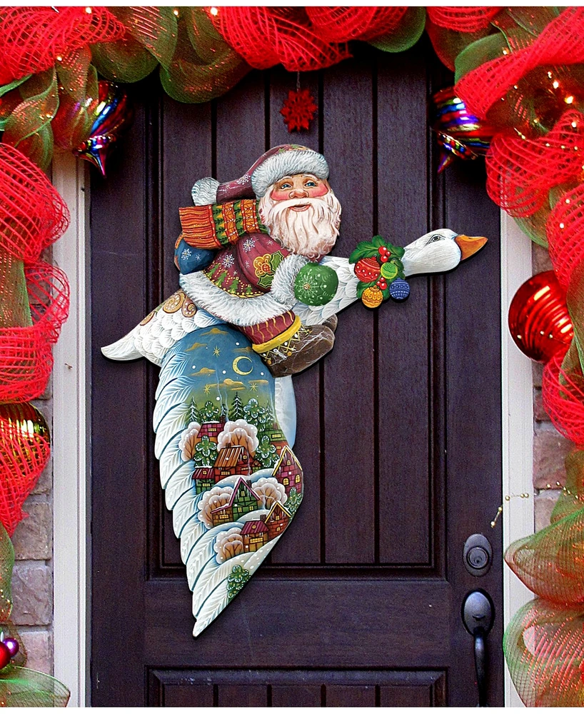 Designocracy Goose Traveling Santa Christmas Door Hanger