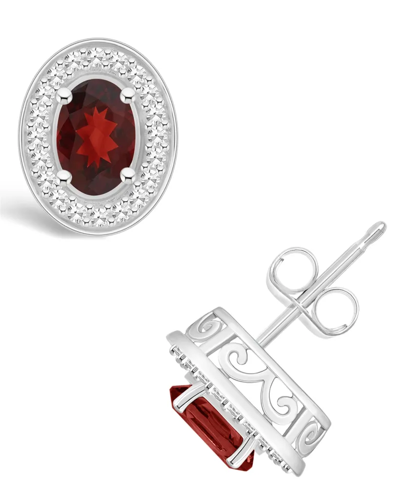 Macy's Garnet (1-1/6 ct. t.w.) and Diamond (1/5 ct. t.w.) Halo Studs in Sterling Silver