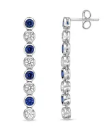 Lab Grown Blue and White Sapphire Bezel Set Drop Earrings in Sterling Silver