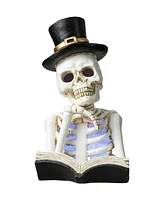 Glitzhome 10.25" H Halloween Lighted Resin Skull Reading Book Table Decor