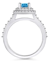 Blue Topaz and Diamond Halo Ring