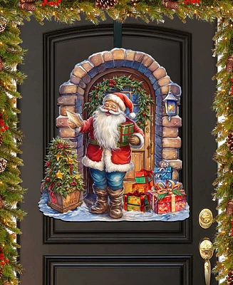 Designocracy Santa's Surprise Visit Christmas Wooden Door Hanger Door Decor G. DeBrekht