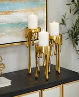 CosmoLiving Aluminum Abstract Pillar Drip Candle Holder Set of 3 - 12", 10", 8" H