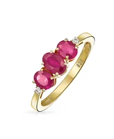 Bling Jewelry Past Present Future 3 Stone Oval Synthetic Red Ruby Ring for Women Yellow 14K Gold Plated .925 Sterling Silver