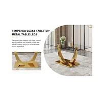 Simplie Fun Table and chair set.Modern rectangular dining table with Transparent tempered glass tabletop and gold plated metal legs.Paired with 8 comf