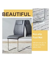 Table and chair set.a Modern Minimalist Style Round Clear Tempered Glass Table with silver Metal Legs.And 4 dark gray chairs with Modern Pu Leather Hi