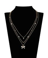 Unwritten Cubic Zirconia and Mother of Pearl Bow Layered Pendant Necklace Set