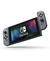 Nintendo Switch 32GB Console Gray Joy-Con Bundle with Surge 11-In-1 Accessory Starter Pack and Super Smash Bros. Ultimate