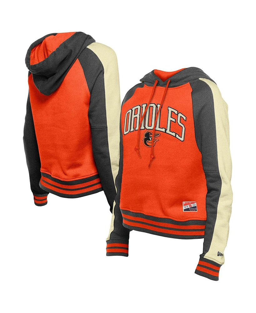 New Era Women's Orange Baltimore Orioles Throwback Cropped Raglan Pullover Hoodie