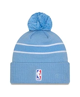 New Era Men's Light Blue Cleveland Cavaliers 2024/25 City Edition Cuffed with Pom Knit Hat