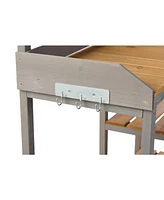 Outdoor potting bench with cabinet