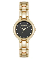 Anne Klein Women's Quartz Delicate Crystal Accented Black Dial Gold-Tone Alloy Metal Watch, 28mm