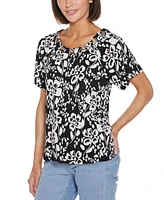 Belldini Women's Grommet Detail Floral Short Sleeve Knit Top