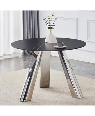 A 42-inch burn stone round table with stainless steel legs can accommodate 4 or 6 diners