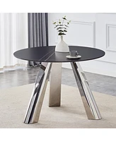 A 42-inch burn stone round table with stainless steel legs can accommodate 4 or 6 diners