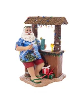 Kurt Adler 11-Inch Fabriche Beach Santa Sitting At Tiki Bar