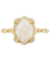 Opal (1 ct. t.w.) & Diamond (1/8 ct. t.w.) Ring in 14k Gold