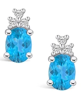 Macy's Topaz (3-1/5 ct. t.w.) and Diamond (1/5 ct. t.w.) Stud Earrings in 14K Gold