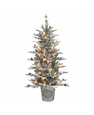 4.5' Pre-Lit Flocked Tree with 100 Underwriters Laboratories Clear Incandescent Lights, 638 Tips