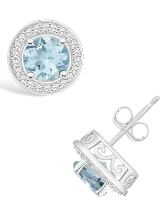 Macy's Aquamarine (1-1/2 ct. t.w.) and Diamond (1/5 ct. t.w.) Halo Studs in Sterling Silver