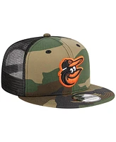 Men's New Era Camo Baltimore Orioles Woodland Camo Trucker 9FIFTY Snapback Hat