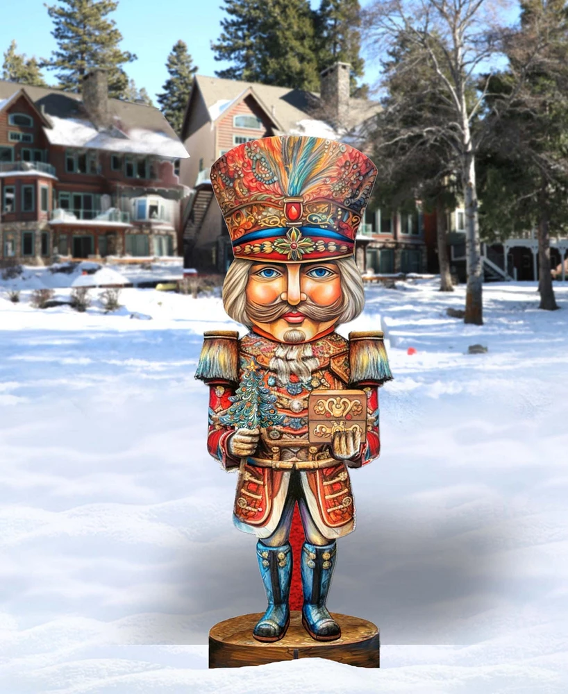 Designocracy Nutcracker with a Heartwarming Surprise 32" Outdoor Holiday Lawn Decor G. DeBrekht