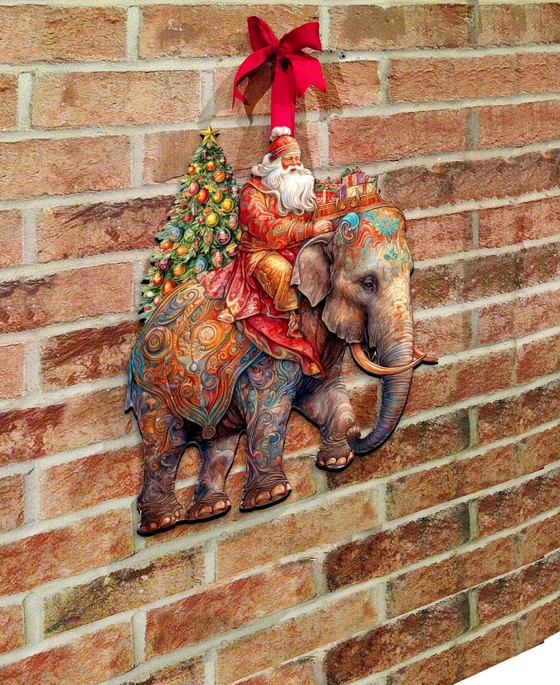 Designocracy Santa on Elephant Christmas Wooden Door Decor Wall Decor G. DeBrekht