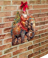 Designocracy Santa on Elephant Christmas Wooden Door Decor Wall Decor G. DeBrekht