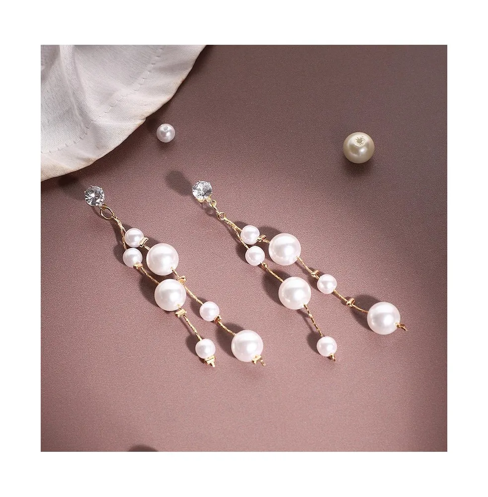 Sohi Women's White Drop Earrings