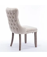 Streamdale Furniture 2 Beige Wingback Dining Chairs with Nailhead Trim & Wood Legs