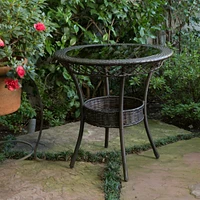 Elegant Paea Multi Brown Pe 27" Glass Table: A Classy Addition to Your Patio